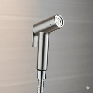 Close-up shot of a handheld bidet toilet faucet sprayer with an ergonomic stainless steel handle.