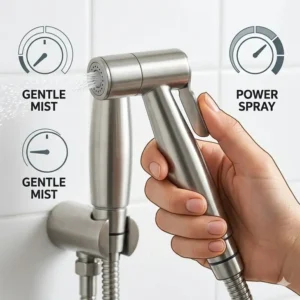 Close up of a hand adjusting the trigger on the best handheld bidet sprayer to control water pressure.
